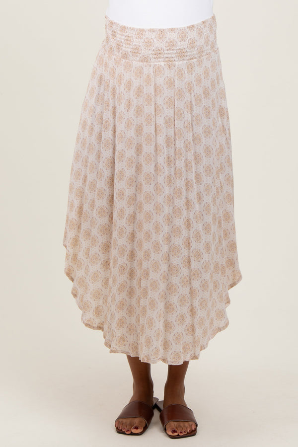 Beige damask print maternity midi skirt with smocked waistband, stylish and comfortable for expecting mothers.