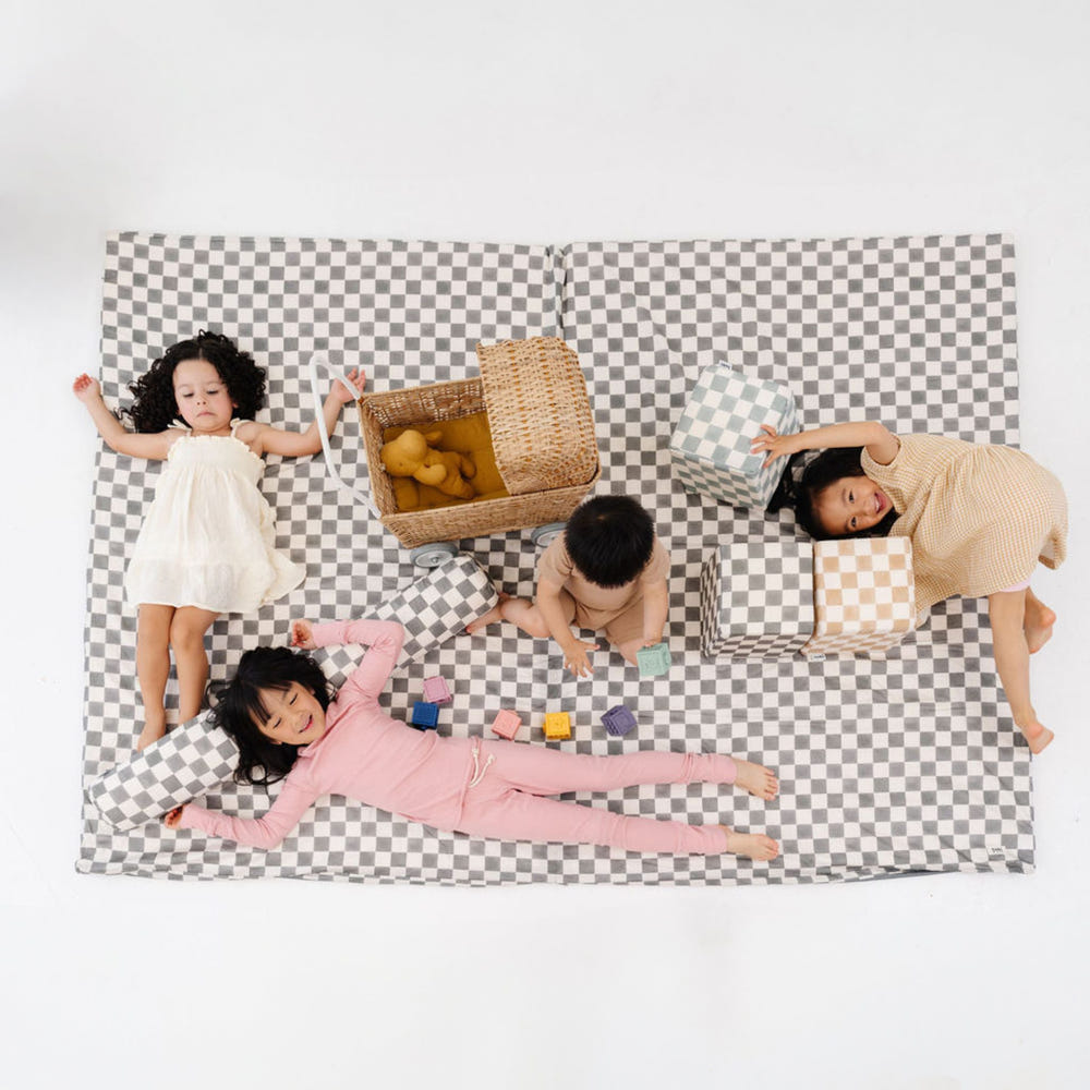Checker Pepper Organic Cotton Mat for babies, perfect for safe and comfortable playtime on any surface.