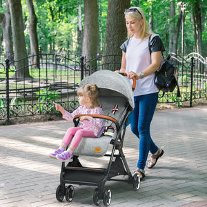 Lightweight aluminium frame baby stroller with net, angled view showcasing design and features.