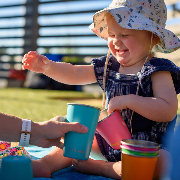 Set of 4 colorful 10oz baby cups, perfect for toddlers and easy to grip.