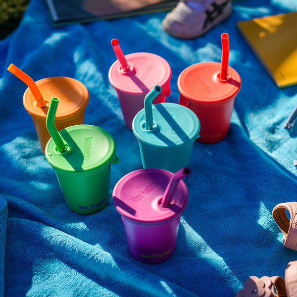10oz kid's cup with straw lid, angled view, perfect for toddlers and kids, colorful design for fun hydration.