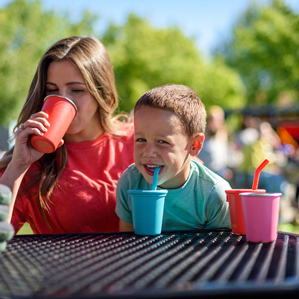 10oz Kid's Cup with Straw Lid at an angle, perfect for toddlers and kids, colorful design for fun hydration.
