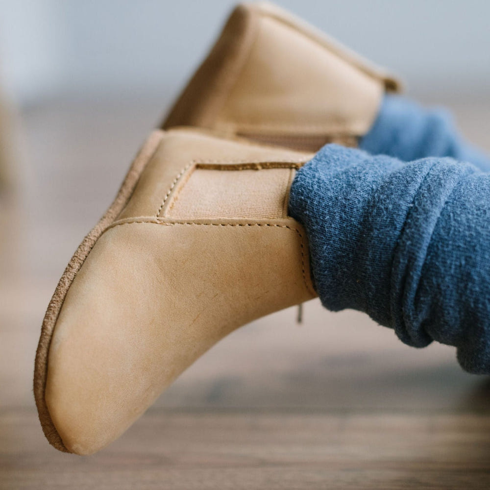 Natural Chelsea Boot for babies with soft sole, perfect for comfort and style. Main product image.