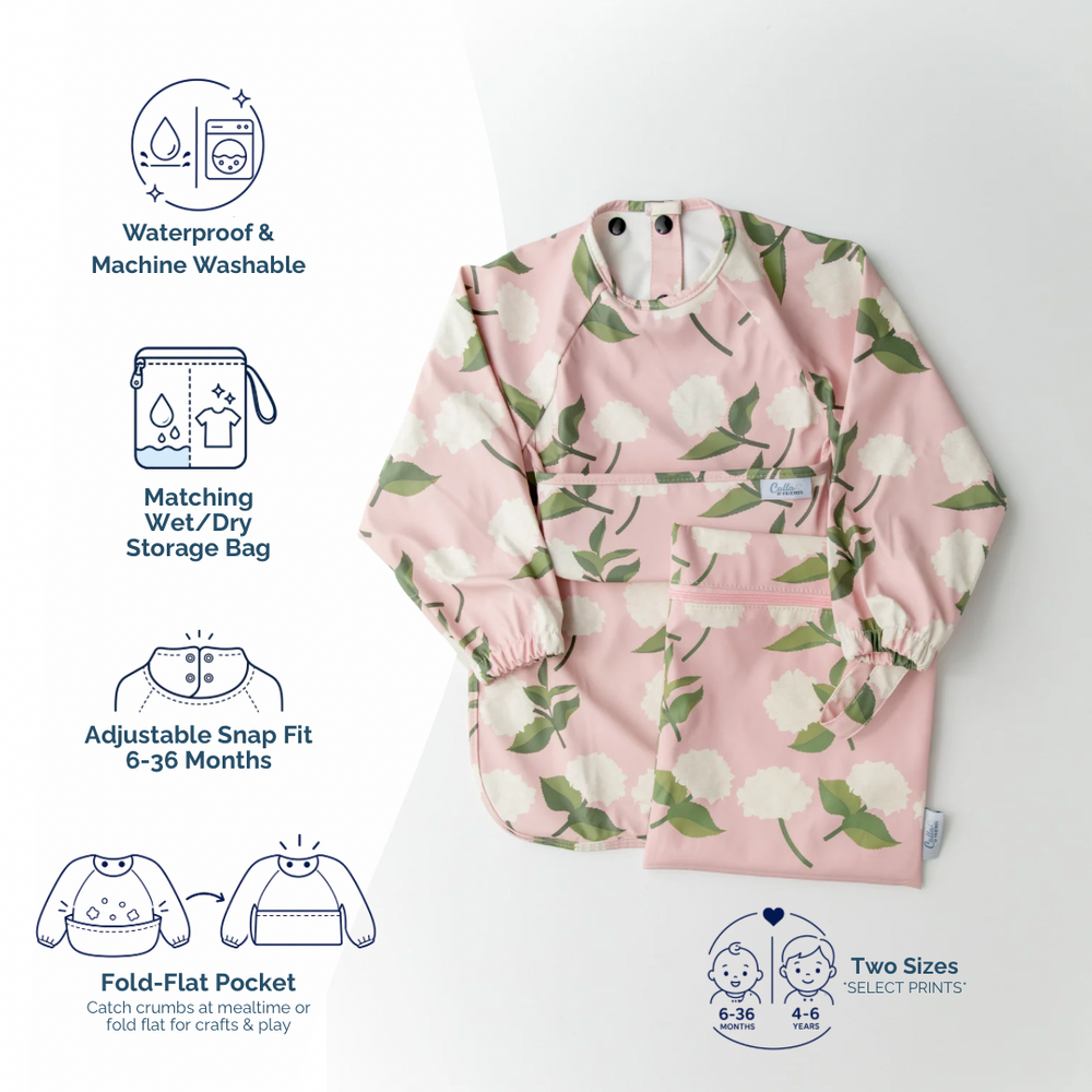 Grayson Long Sleeve Bib featuring a fun dinosaur design for mess-free mealtime. Perfect for babies and toddlers.