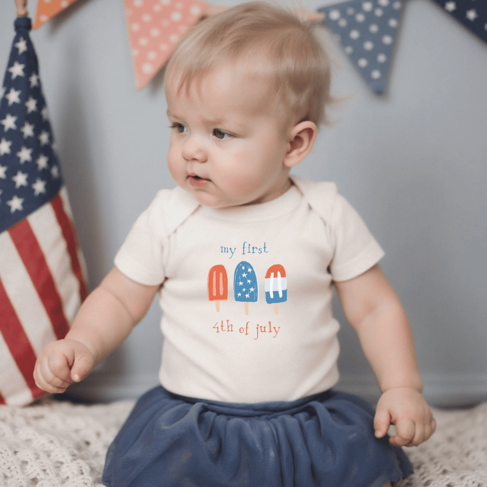 Short sleeve graphic bodysuit featuring colorful popsicles for babies. Perfect for summer fun!