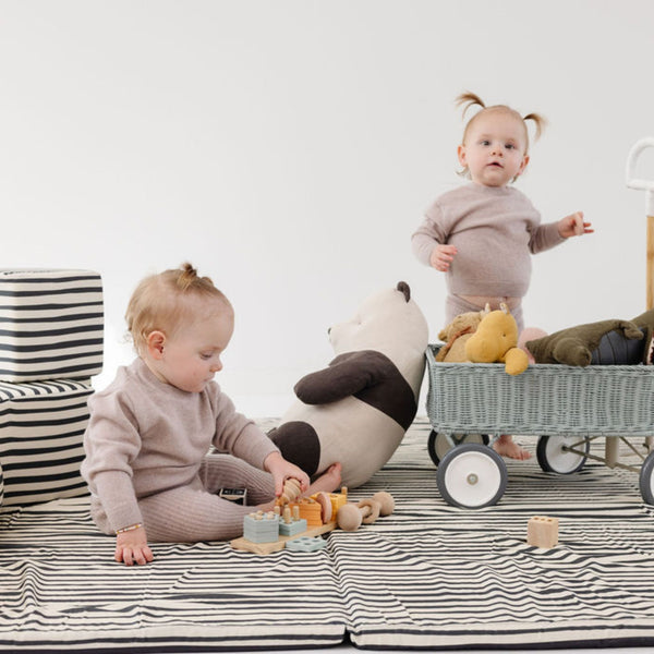 Bold Stripe Organic Cotton Mat for babies, perfect for playtime, shown at a 10-degree angle.
