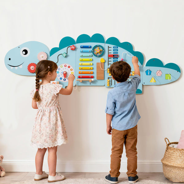 Colorful 11-in-1 dinosaur activity wall busy board for toddlers, promoting education and early development through play.