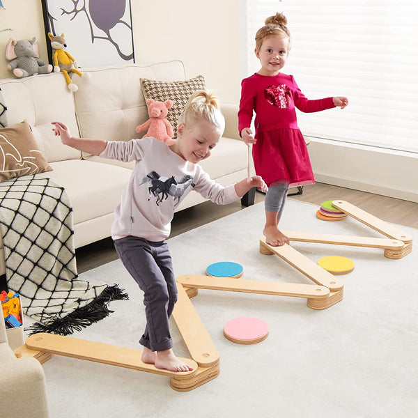 Colorful 12-piece wooden balance beam and stepping stones set for kids' play and development.