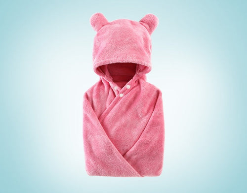 Soft cotton hooded bath towel for babies, perfect for cozy post-bath snuggles.