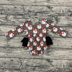 Leopard Santa ruffle romper for babies, festive holiday outfit, stylish and cute, angle view.