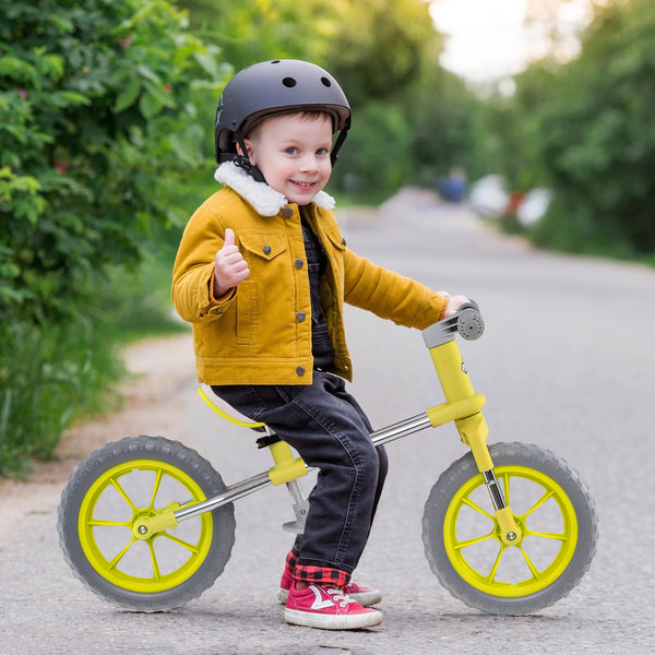 12-inch balance bike with adjustable seat and rotatable handlebar for toddlers, perfect for outdoor play and learning balance.