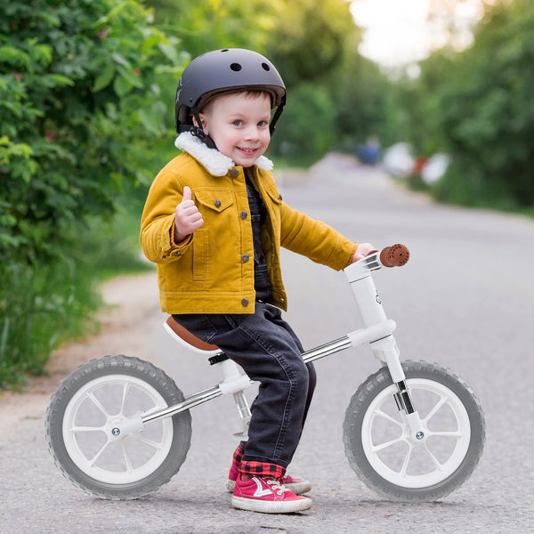 12-inch balance bike with adjustable seat and rotatable handlebar, perfect for toddlers learning to ride.