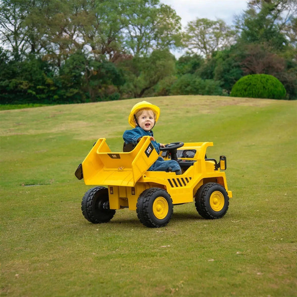 12V CAT Electric Dump Truck Ride-On for kids, angle view showcasing design and features. Perfect for outdoor fun!