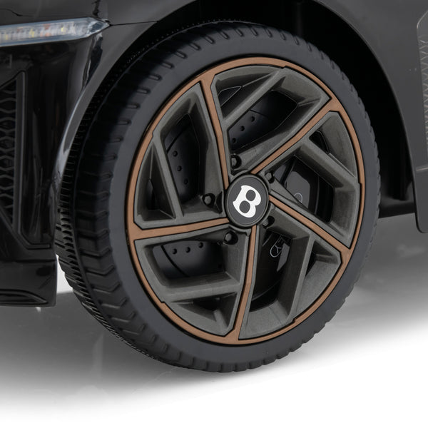 12V Bentley Bacalar kids ride-on car in angle view, perfect toy for young racers.