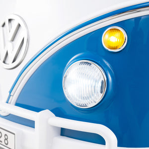 12V Volkswagen ride-on bus for kids 3+, featuring cup holder and LED headlights, angled view.
