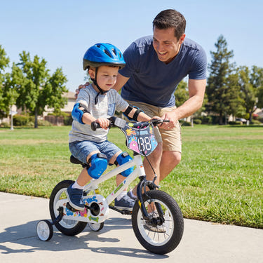 12-inch white kids bike with training wheels for ages 3-4, featuring vibrant street art design.