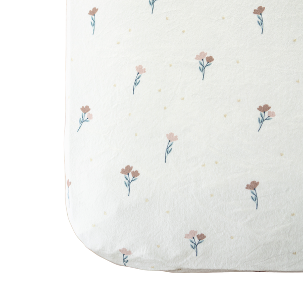 Minky Stretch Luxe Crib Sheets in soft fabric, angle view showcasing stylish design and comfort for baby’s crib.