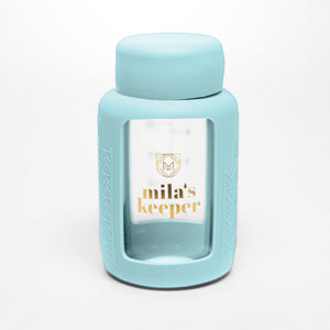 Set of 2 glass breast milk bottles at angle 46, perfect for safe and stylish breast milk storage.