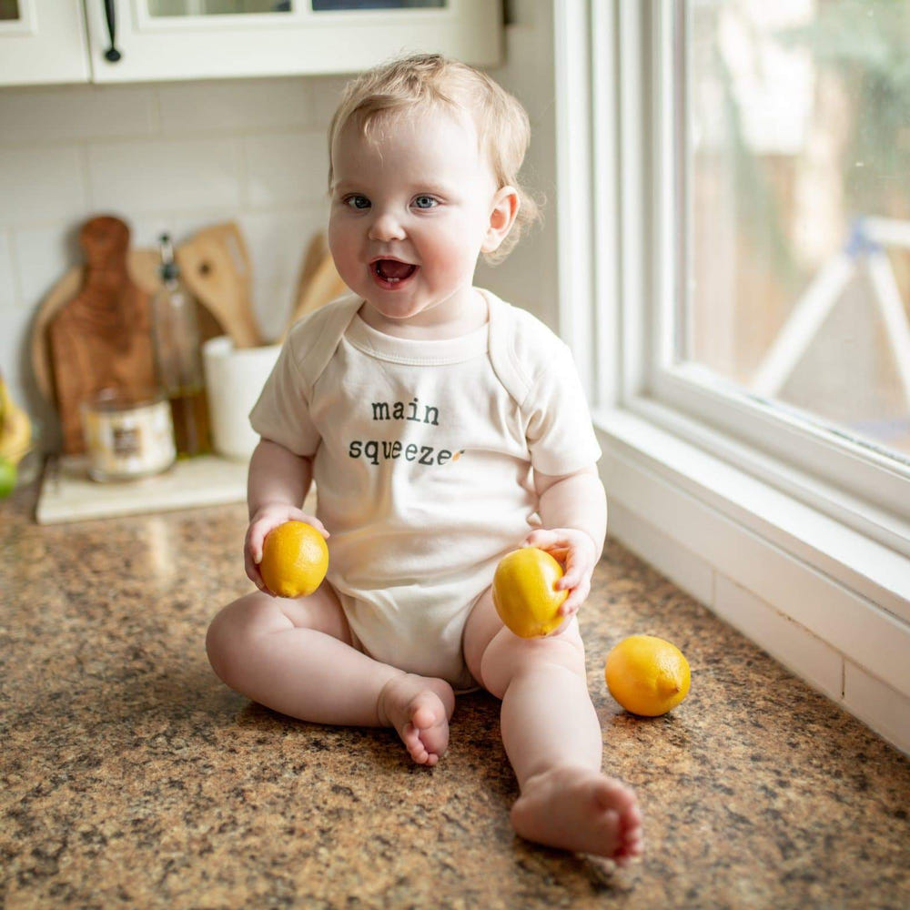 "Summer 4 pack graphic bodysuit set for babies, includes 1 free bodysuit, vibrant designs for stylish comfort."