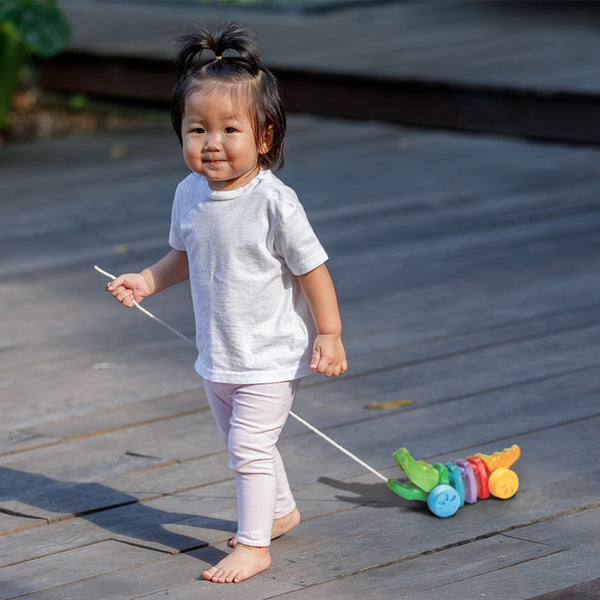 Colorful Rainbow Alligator toy for babies, perfect for playtime and entertainment. Angle 3 view showcasing its vibrant design.