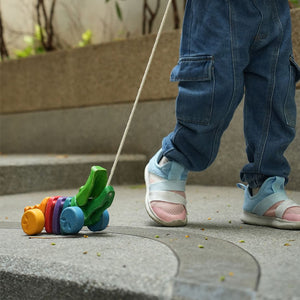 Colorful Rainbow Alligator toy for babies, perfect for playtime and entertainment. Angle 5 view showcasing its vibrant design.