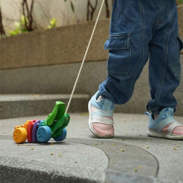 Colorful Rainbow Alligator toy for babies, perfect for playtime and entertainment. Angle 5 view showcasing its vibrant design.