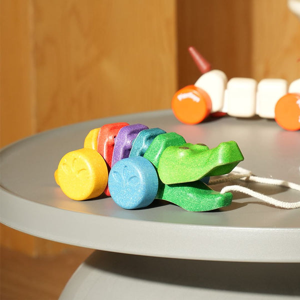 Colorful Rainbow Alligator toy for babies, perfect for playtime and sensory exploration. Angle 7 view.