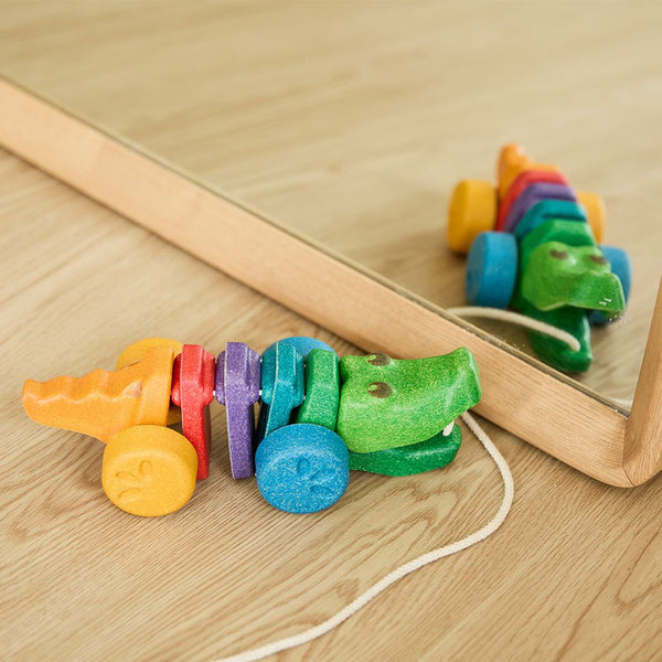 Colorful Rainbow Alligator toy for babies, perfect for playtime and entertainment.