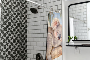 Sleepy Koala shower curtain in a modern farmhouse bathroom with subway tile