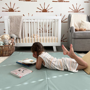 Sage Vegan Leather Play Mat for babies, showcasing a stylish and soft design from angle 5. Perfect for playtime.