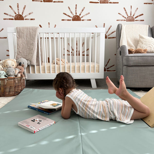 Sage Vegan Leather Play Mat for babies, showcasing a stylish and soft design from angle 5. Perfect for playtime.