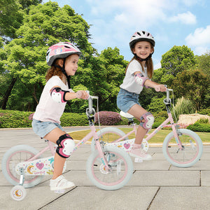 12-inch pink kids bike with stars and moon design, adjustable for children aged 3-8, viewed at a 30-degree angle.