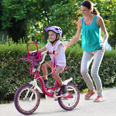 14-inch kids bike with doll seat and removable training wheels, perfect for outdoor fun and learning to ride.