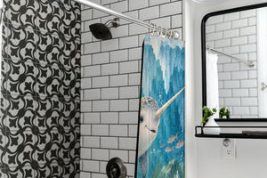 Baby Narwhal Ocean shower curtain in a modern farmhouse bathroom with subway tile