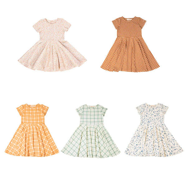 Sweetheart Twirl Dress in Buckwheat Plaid, made from organic cotton jersey, perfect for baby swimwear.