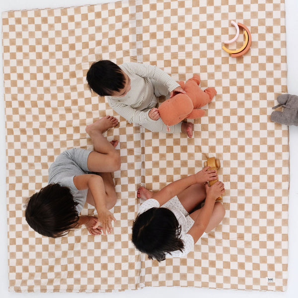 Checker Toffee Organic Cotton Mat for babies, soft play mat in angle 8 view, perfect for safe and stylish playtime.