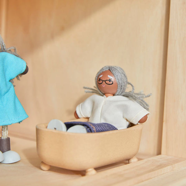 Medium skin tone grandmother dollhouse figure for imaginative pretend play, shown from angle 2.