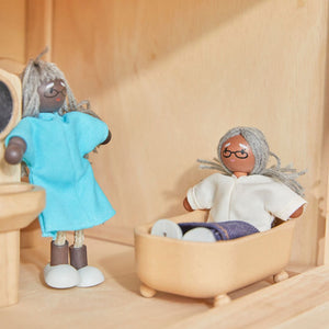 Medium skin tone grandmother dollhouse figure for imaginative pretend play, shown from angle 3.