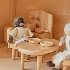 Grandfather dollhouse figure with dark skin tone for imaginative pretend play, shown from angle 2.