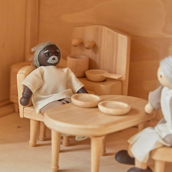 Grandfather dollhouse figure with dark skin tone for imaginative pretend play, shown from angle 2.