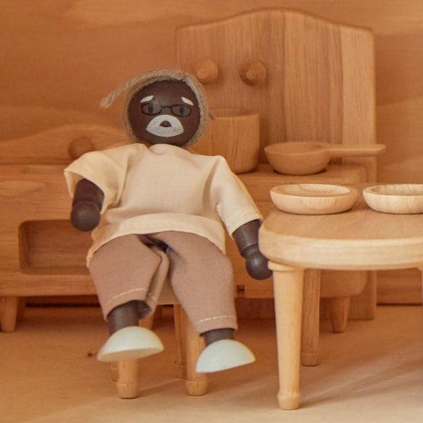 Grandfather dollhouse figure with dark skin tone for imaginative pretend play, shown from angle 3.