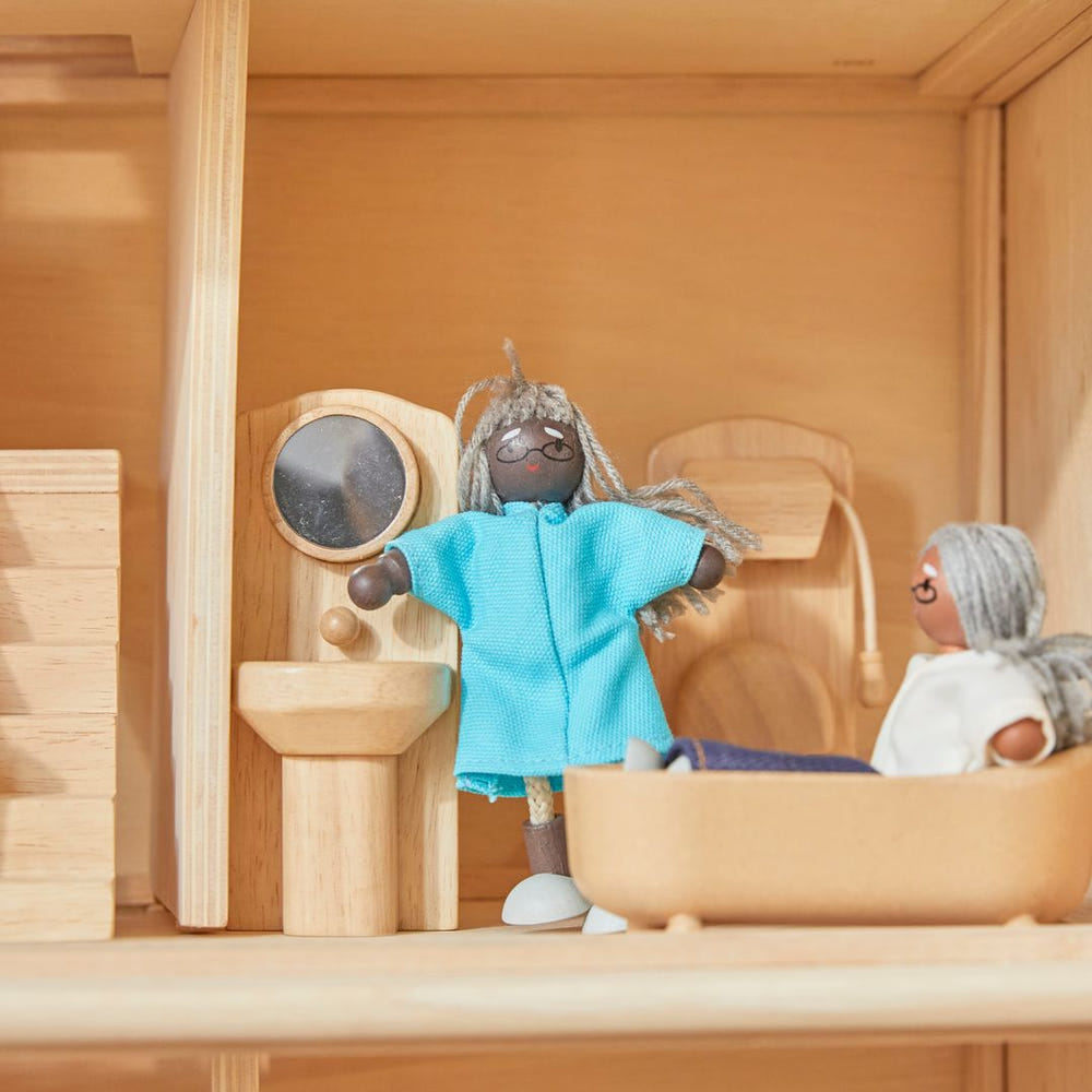 Grandmother dollhouse figure with dark skin tone for imaginative pretend play.