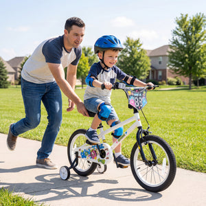 12-inch white kids bike with training wheels for ages 3-4, featuring street art design, angled view.