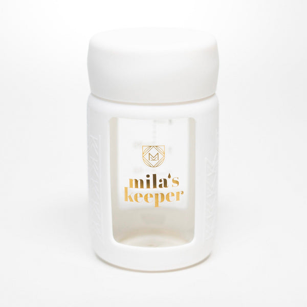 Set of 2 glass breast milk bottles at angle 28, perfect for safe breast milk storage.