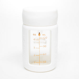 Set of 2 glass breast milk bottles at angle 29, perfect for safe and stylish breast milk storage.