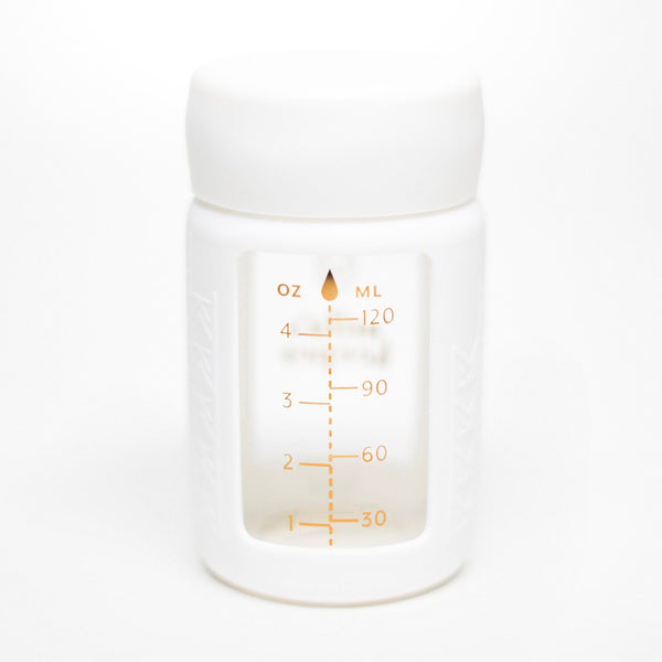 Set of 2 glass breast milk bottles at angle 29, perfect for safe and stylish breast milk storage.