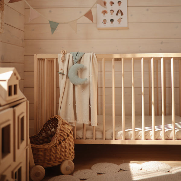 Soft Moon Lovey Blanket for babies, perfect for cuddling and comfort, shown at an angle.
