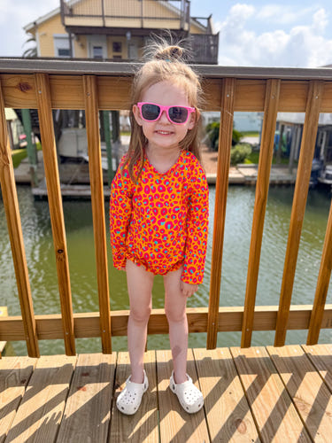 Wild leopard rash guard swimsuit for babies, perfect for sun protection and fun in the water.
