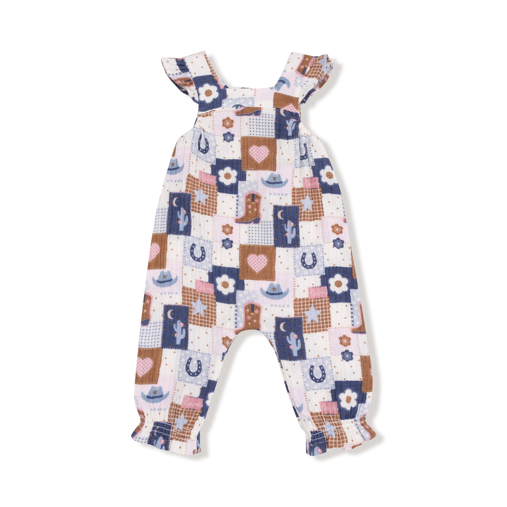 Smocked overall set for babies featuring a colorful patchwork cowgirl design. Perfect for stylish little ones!