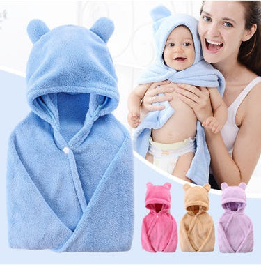 Soft cotton hooded bath towel for babies, perfect for cozy post-bath snuggles.